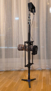 The rig was stable enough to stand on its own. Technically, any lens could be mounted. The clearance was wide enough to mount the 100-400mm and 300mm from both the front and back. However, larger lenses would have to be mounted from the rear (the camera side) only. Due to unstable nature of BT connection an USB cable was utilized.